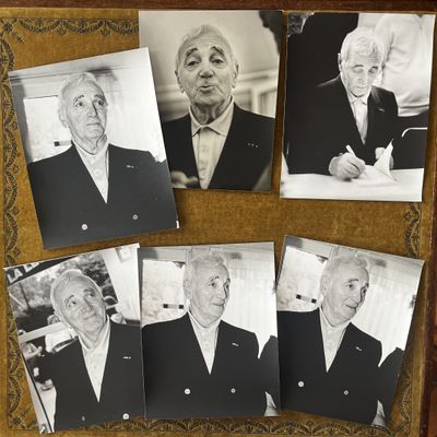 several black and white photos of older men in suits and ties