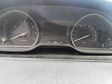 a close up of a car dashboard with a speedometer