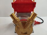 a close up of a fire hydrant on a table with a red box