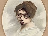 an old picture of a woman with makeup and eyeglasses