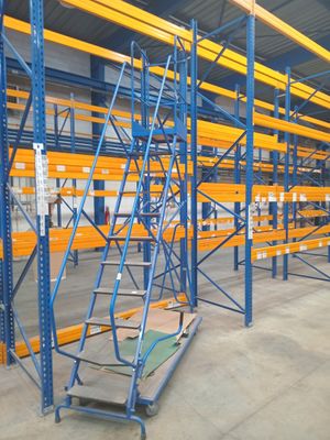 a large warehouse racking system with a dolly dolly in the middle of it