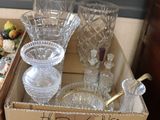 a box with a lot of glass items in it