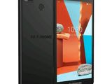 a black smartphone with a picture of a rock on the screen