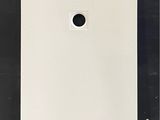 an image of a white door with a hole in it