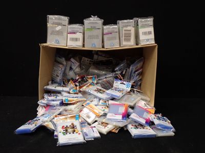 a cardboard box filled with lots of different types of items