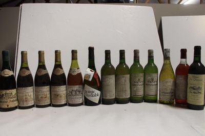 many bottles of wine lined up on a table