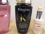 a bottle of kerastase and a bottle of kerastase on a table