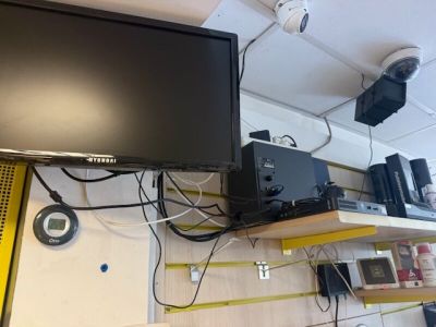 a flat screen tv mounted on a wall in a room