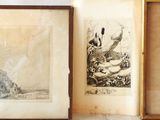 three framed pictures of a windmill and a windmill on a wall