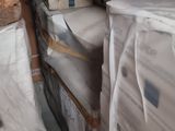 many boxes of mattresses stacked on top of each other