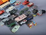 a lot of toy cars that are on a table