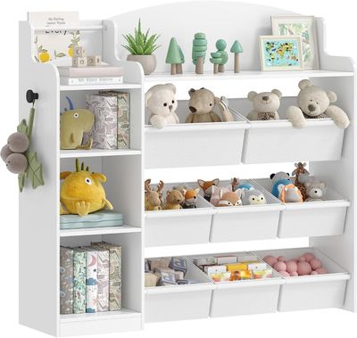 many stuffed animals on the shelves in the room