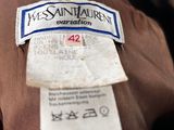 the label of a brown jacket with a blue and white stripe on it