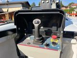 a close up of a control panel on the back of a boat