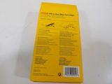 the back of a yellow box with a black and white picture of a plane