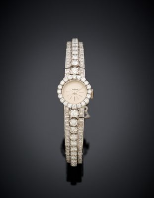 a lady ' s diamond set wristwatch, by cartier