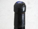 a bottle of wine that is sitting on a table