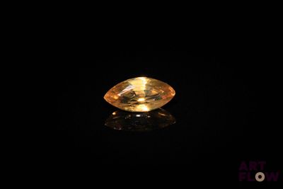 a yellow diamond on a black background