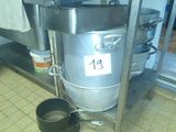 an image of a kitchen with a pot and a kettle on the floor