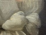 a close up of a painting of a teddy bear with a flower