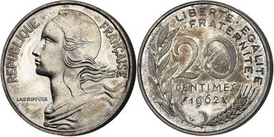a close up of a coin with a woman ' s face on it