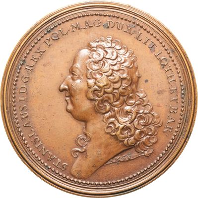 l'image d'une pièce d'or sur laquelle figure une tête de femme