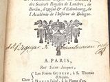 an old book with a picture of a coat of arms on it