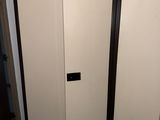 two doors that are open in a room