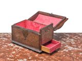 a small wooden box with a drawer inside of it