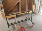 a cart that has some boxes on it in a room