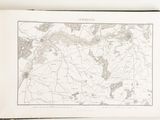 an open book with a map on it on a table