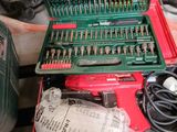 a tool box with tools in it sitting on a table
