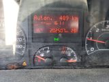 a close up of a car dashboard with a speedometer