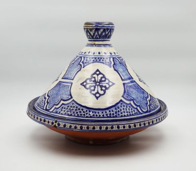 un bol bleu et blanc orné d'un motif décoratif