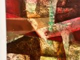painting of a red and green abstract painting on a white wall