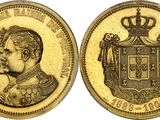 une pièce d'or sur laquelle figure l'effigie d'un homme coiffé d'une couronne