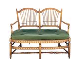 a bench with a green cushion on top of it