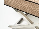an image of a foot stool with a cushion on top of it
