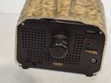 a small radio that is sitting on a table