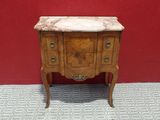 an image of a small wooden table with a marble top