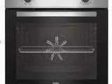 a close up of a stainless steel oven with the door open