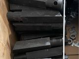 many pieces of metal that are sitting in a box