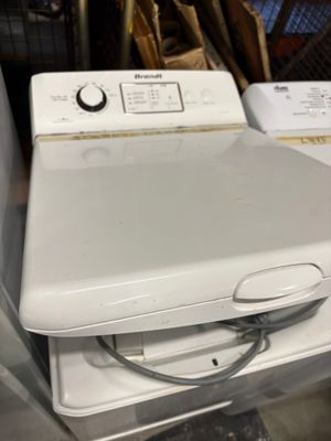 a white washer and dryer sitting next to each other
