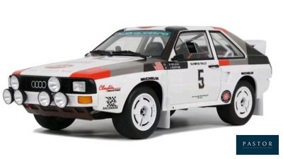 an image of a model of a white and red car on a white background