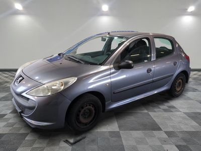 a picture of a silver car parked in a garage