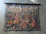 an image of a tapestry hanging on the wall of a room