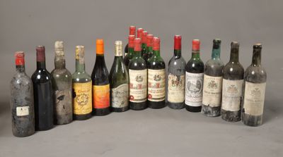 Plusieurs bouteilles de vin sont alignées sur une surface grise