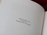 an open book that has a picture of a man on it
