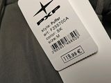 a label on the back of a jacket with a picture of a plane on it
