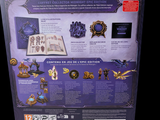 the back of a box with a picture of a dragon and other items